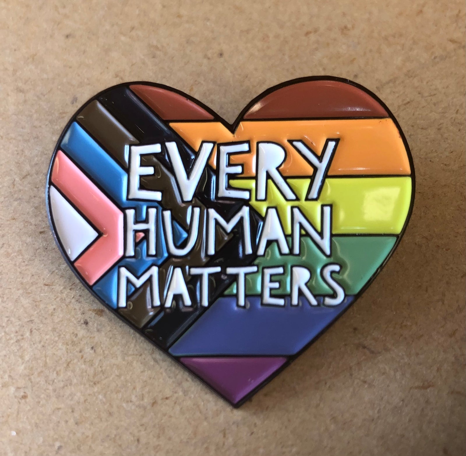 Every Human Matters Pin